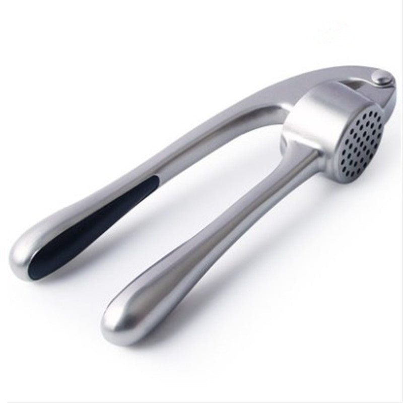 Discover the Manual Garlic Press Kitchen Gadget