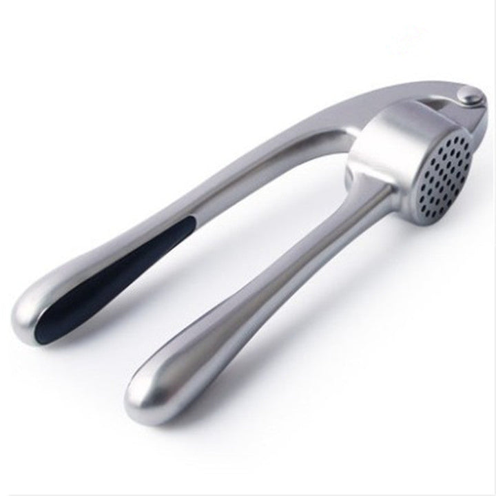 Discover the Manual Garlic Press Kitchen Gadget